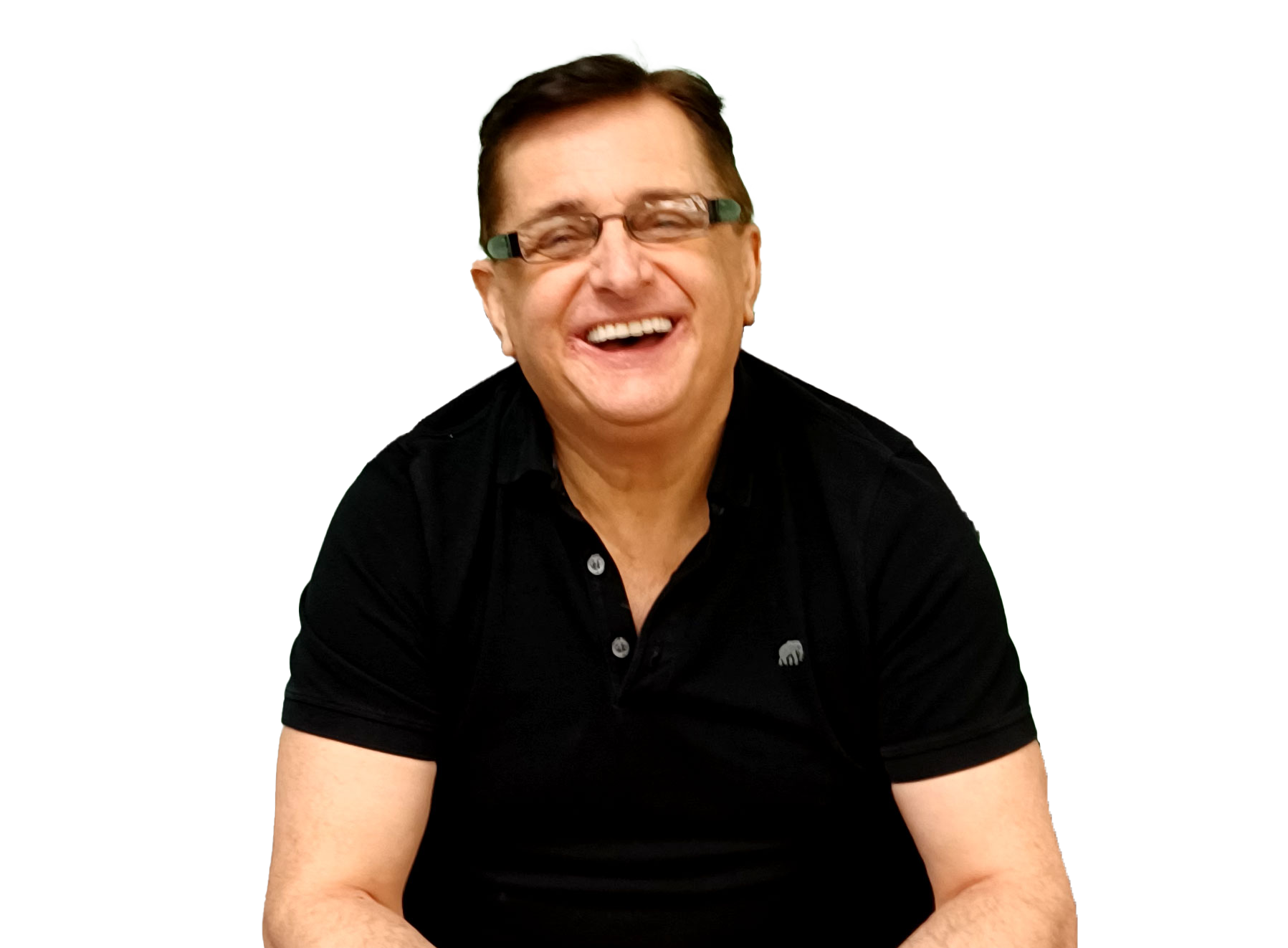 Rob Bezanson, wearing glasses and a black polo shirt is smiling at the camera.