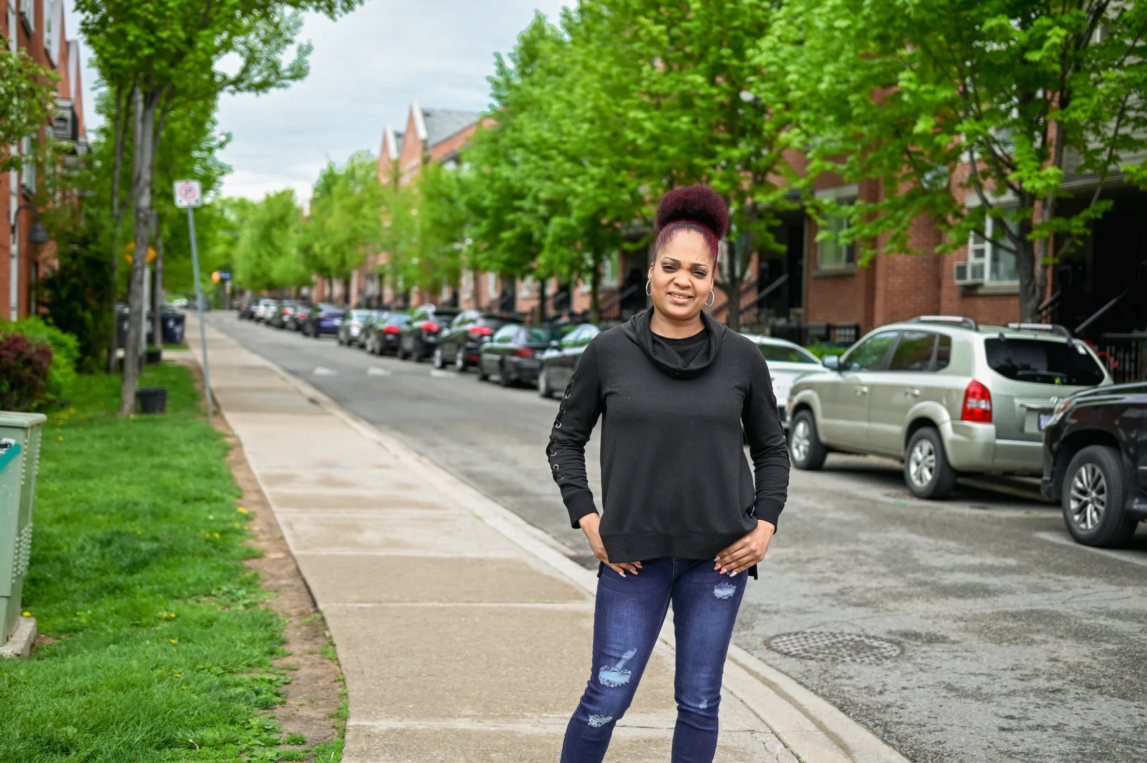 Photo of a person standing in the street