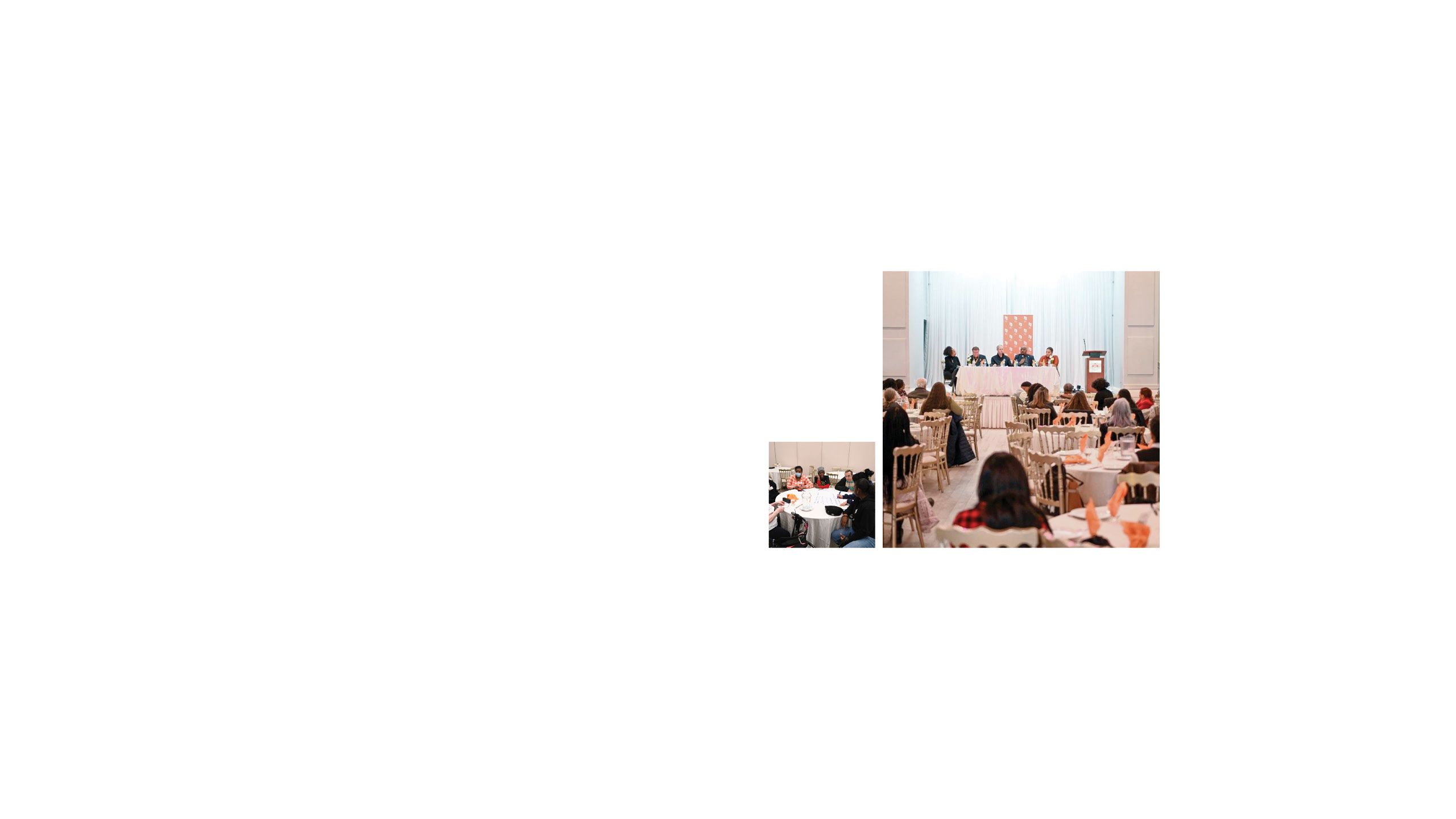 Photo of people sat at tables looking at a stage where people are seated and are addressing the room