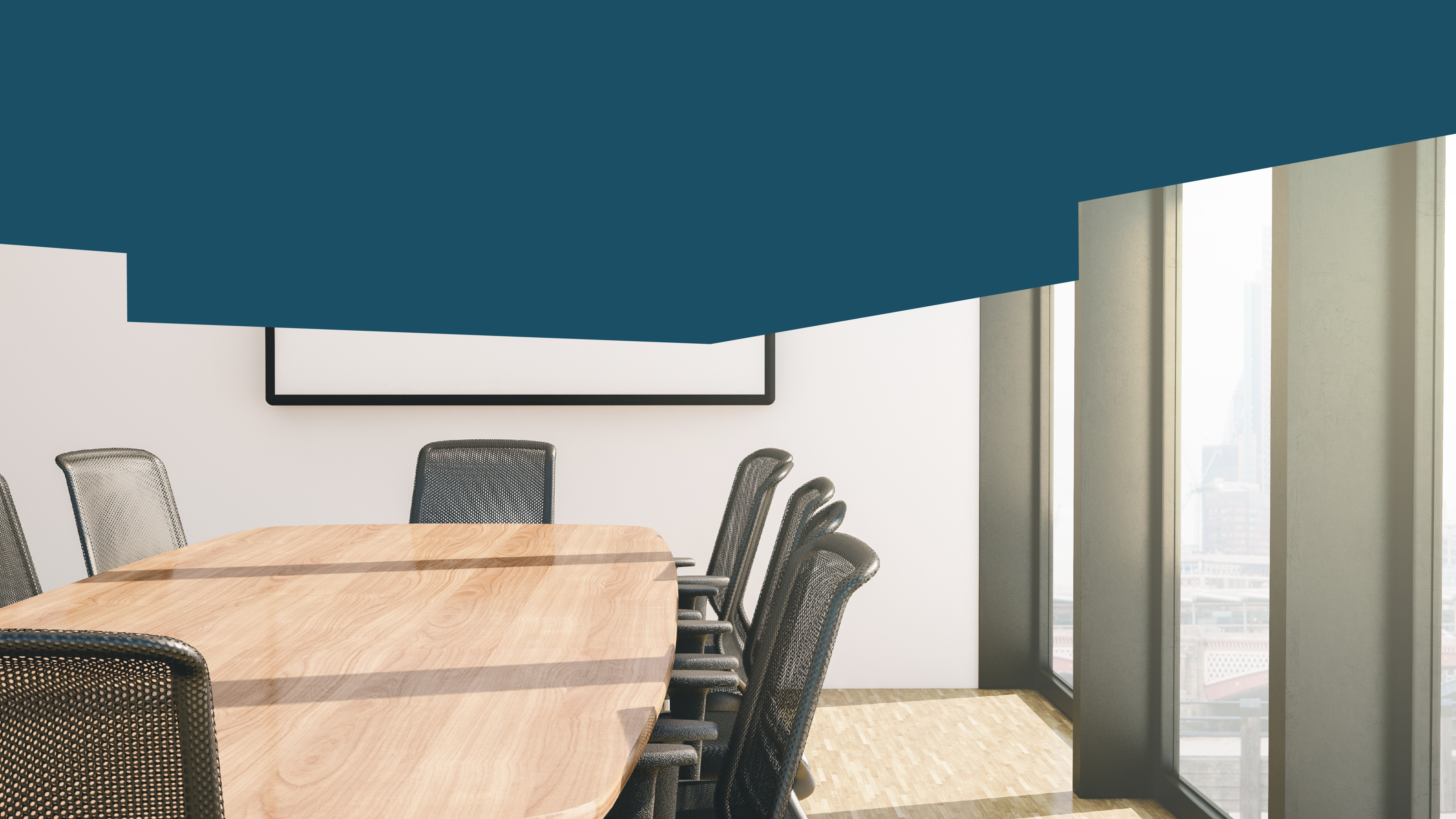 Empty meeting room in a high-rise office, black office chair surround a wood conference table.