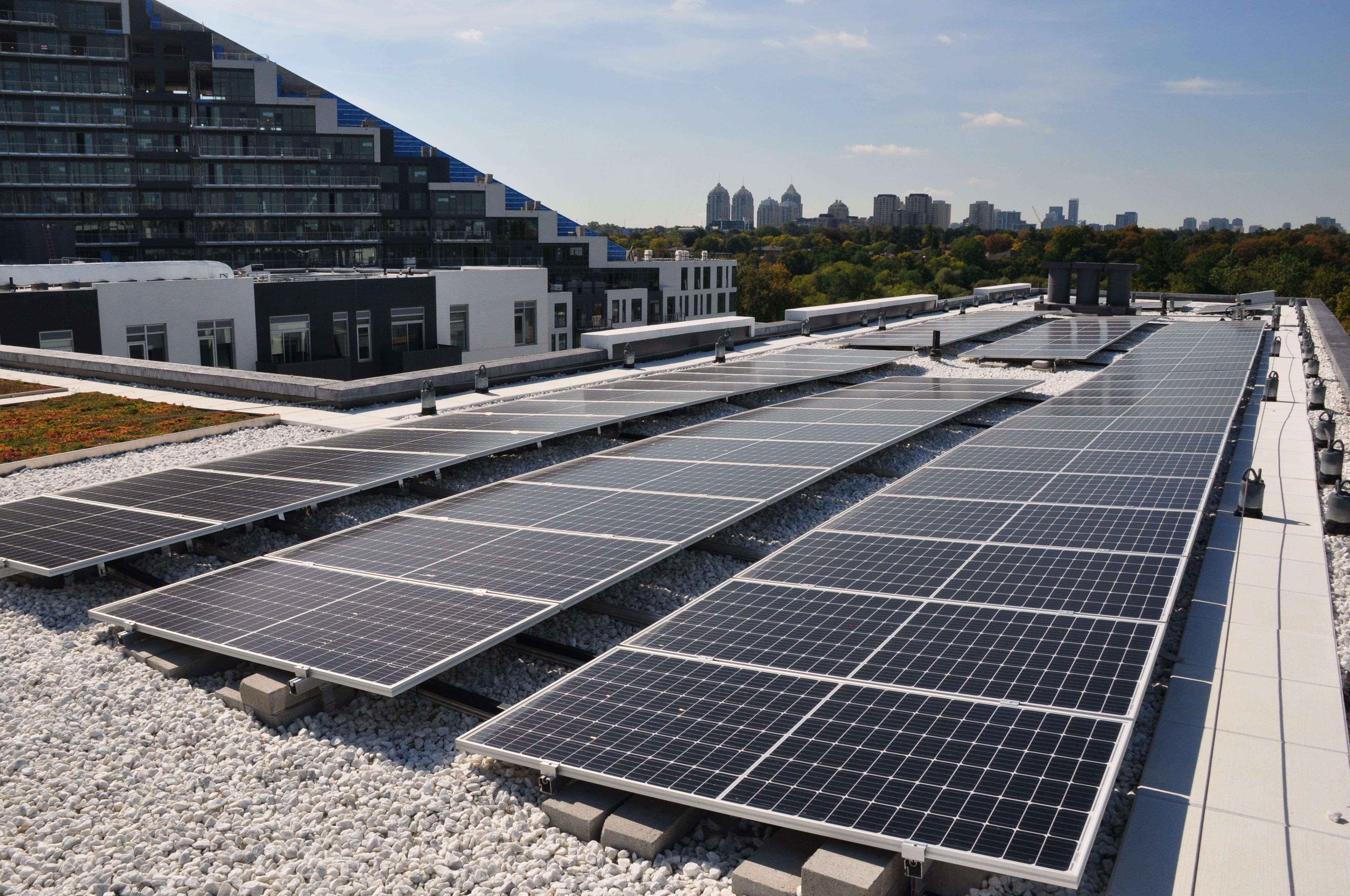 Solar panels on top of a TCHC building at Leslie Nymark.